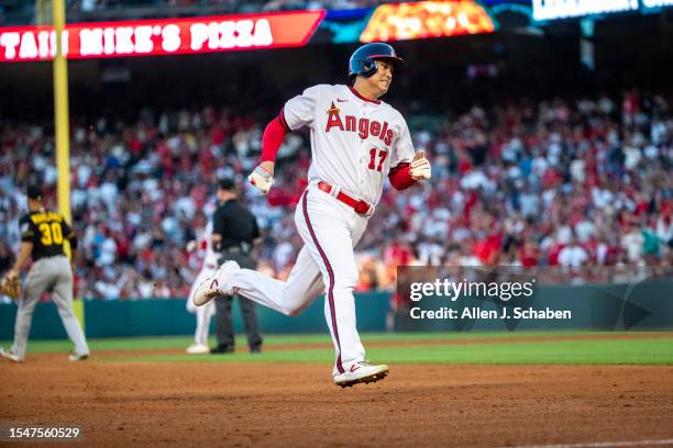 Anaheim, CA Angels starting pitcher and two-way player Shohei Ohtani rounds the bases, scoring on Angels center fielder Mickey Moniak's RBI double in...