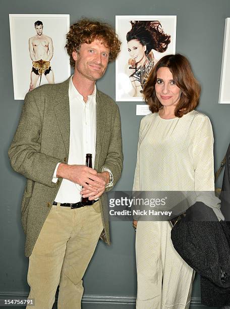 Nicholas Rohl of Moshimo and Paola Maugeri attend the private view of Rankin: Fishlove on October 25, 2012 in London, England.
