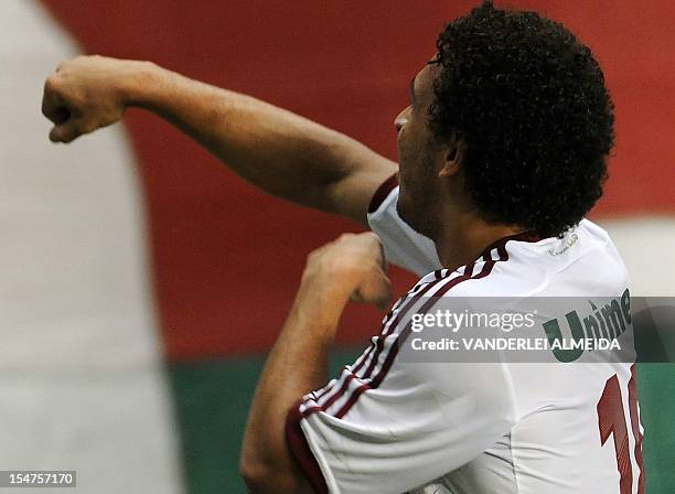 Footballer Wellington Nem of Fluminense celebrates after scoring against Coritiba during a Brazilian Cup football match held at the Joao Havelange...