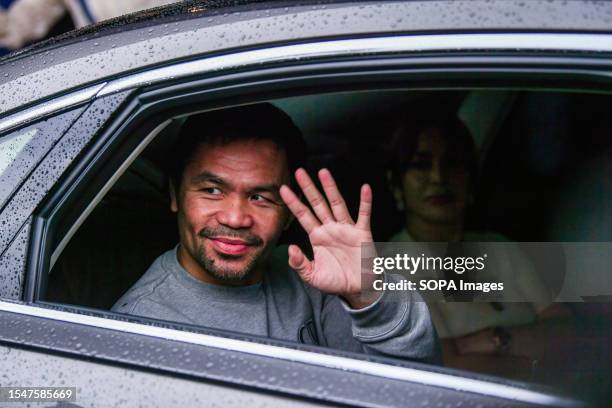 Legendary Filipino boxer Manny Pacquiao leaves after a joint press conference on his upcoming battle against Thai Muay Thai fighter Buakaw Banchamek.