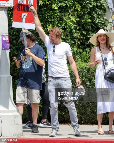 Jimmi Simpson is seen picketing with SAG-AFTRA and WGA members outside of the Paramount Studios on July 21, 2023 in Los Angeles, California.