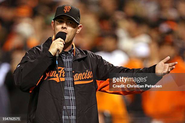 Actor Colin Hanks addresses the crowd as the San Francisco Giants host the Detroit Tigers during Game Two of the Major League Baseball World Series...