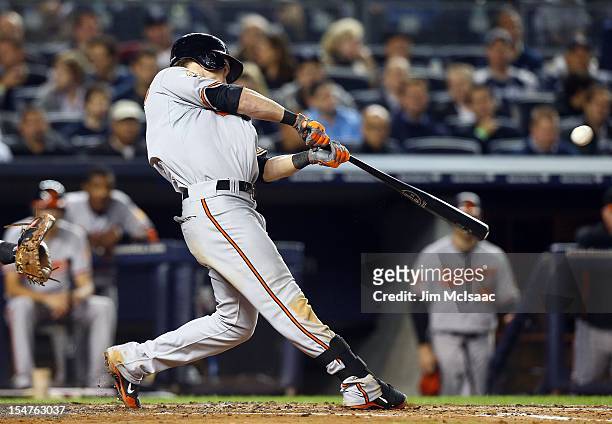 Nate McLouth of the Baltimore Orioles in action against the New York Yankees during Game Three of the American League Division Series at Yankee...