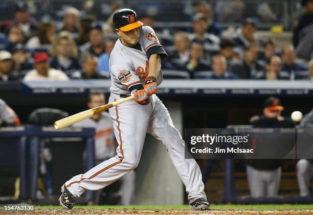 Manny Machado of the Baltimore Orioles in action against the New York Yankees during Game Three of the American League Division Series at Yankee...