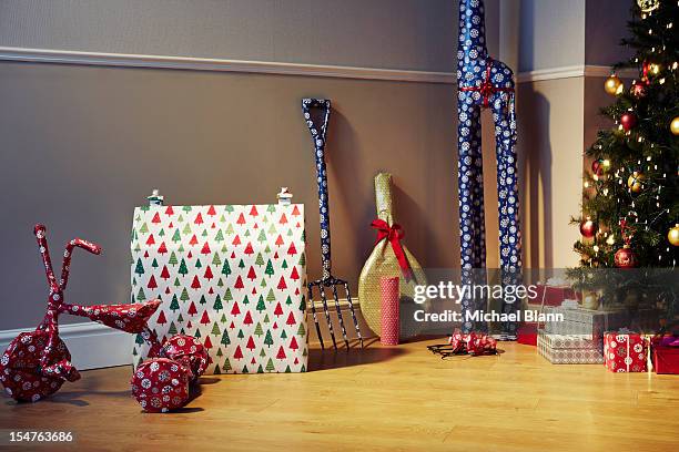 various unusual christmas presents wrapped - christmas bike stock pictures, royalty-free photos & images