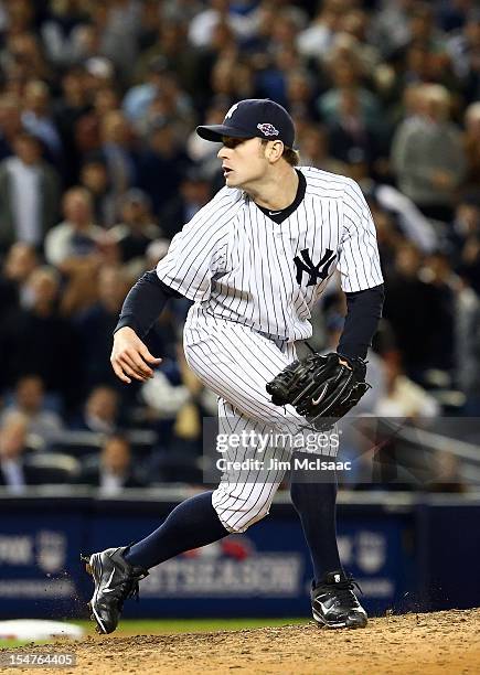 David Robertson of the New York Yankees in action against the Baltimore Orioles during Game Three of the American League Division Series at Yankee...