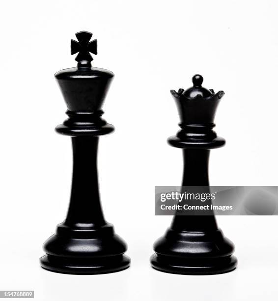 chess king and queen pieces - queen chess piece stock pictures, royalty-free photos & images