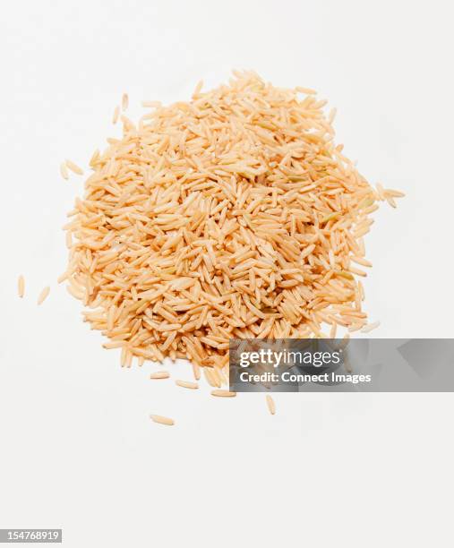 brown rice - brown rice stock pictures, royalty-free photos & images