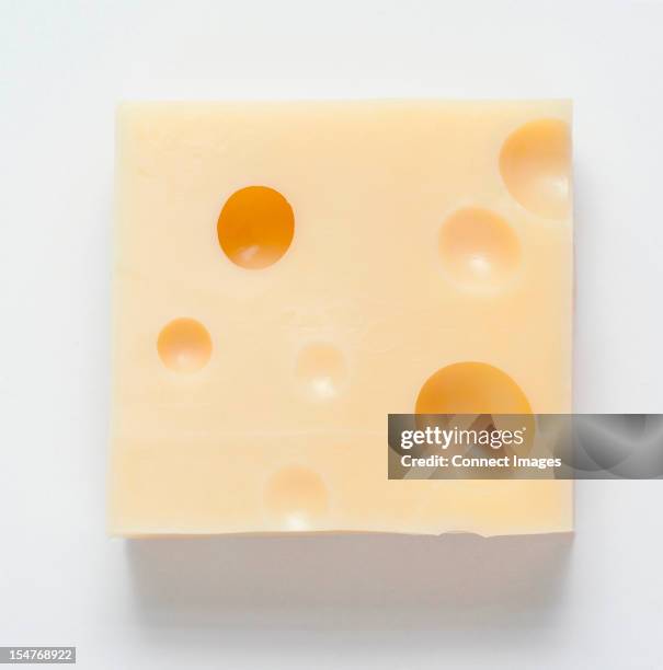 chunk of cheese - slab white background stock pictures, royalty-free photos & images