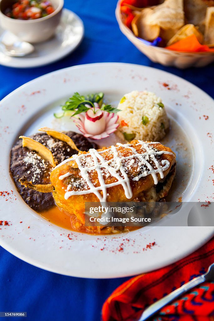 Traditional Mayan dish of stuffed pepper with rice and beans