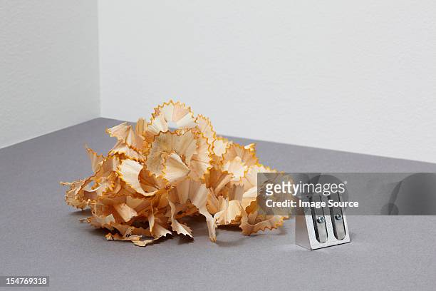 pencil shavings and pencil sharpener - pencil shavings stock pictures, royalty-free photos & images