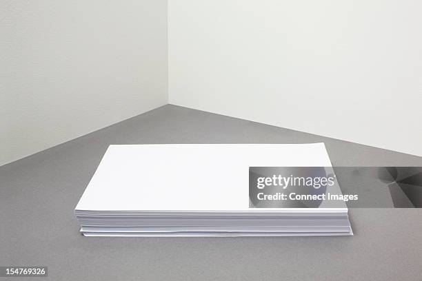 stack of blank paper - paper stack stock pictures, royalty-free photos & images