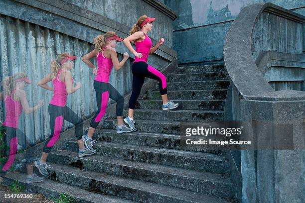 young woman running up stairs, multiple image - multiple images of the same person stock pictures, royalty-free photos & images