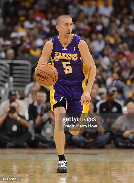 Steve Blake of the Los Angeles Lakers dribbles up court during the game against the Los Angeles Clippers at Staples Center on October 24, 2012 in Los...