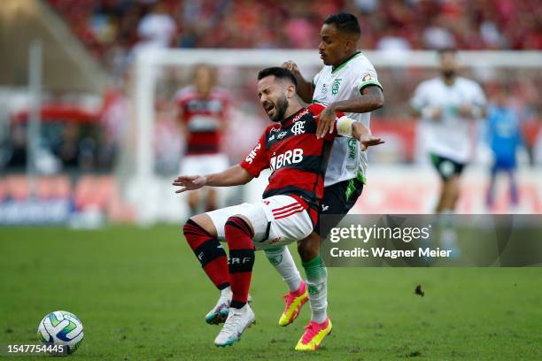 Everton Ribeiro of Flamengo fights for the ball with Paulinho Boia of America MG during the match between Flamengo and America MG as part of...