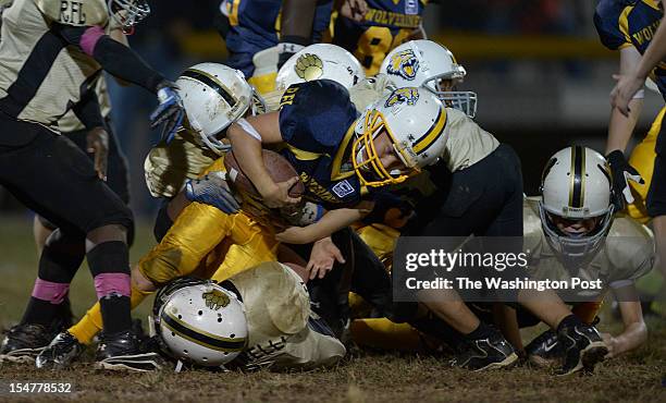 Pee Wee Wolverine running back Kosta Berns during a game in Rockville on Friday, September 28, 2012.