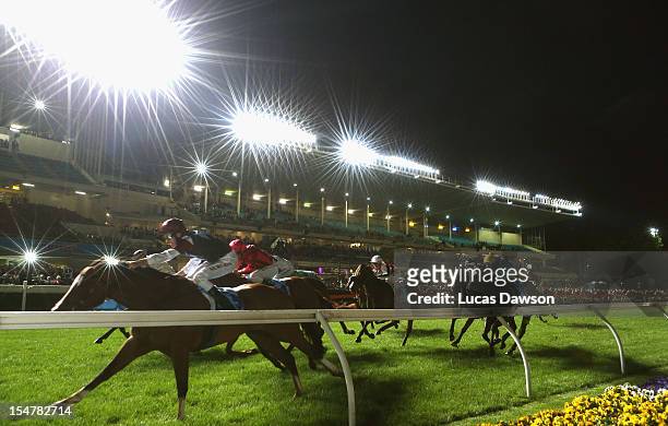 Michael Rodd riding Angelic Light wins the Printhouse Crokett Stakes during the Manikato Stakes Night at Moonee Valley Racecourse on October 26, 2012...
