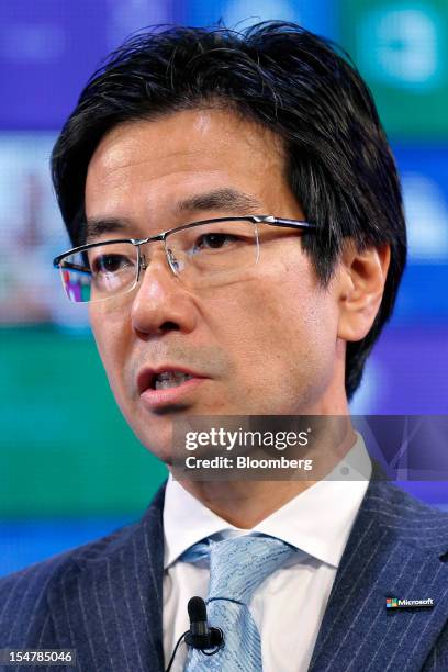 Yasuyuki Higuchi, president and chief executive officer of Microsoft Japan Co., speaks during a launch event for Microsoft Corp.'s Windows 8...
