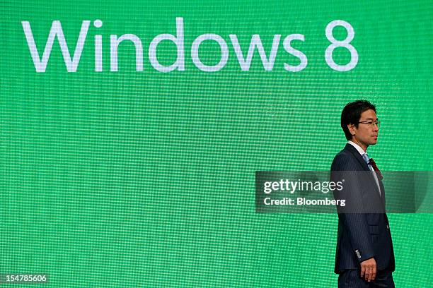 Yasuyuki Higuchi, president and chief executive officer of Microsoft Japan Co., attends a launch event for Microsoft Corp.'s Windows 8 operating...