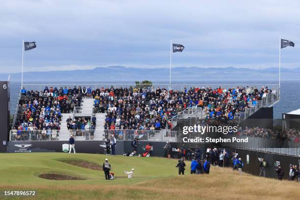 Rory McIlroy of Northern Ireland plays a bunker shot on the 6th hole during Day Four of the Genesis Scottish Open at The Renaissance Club on July 16,...