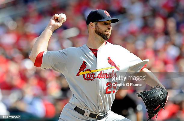 Chris Carpenter of the St. Louis Cardinals pitches against the Washington Nationals during Game Three of the National League Division Series at...