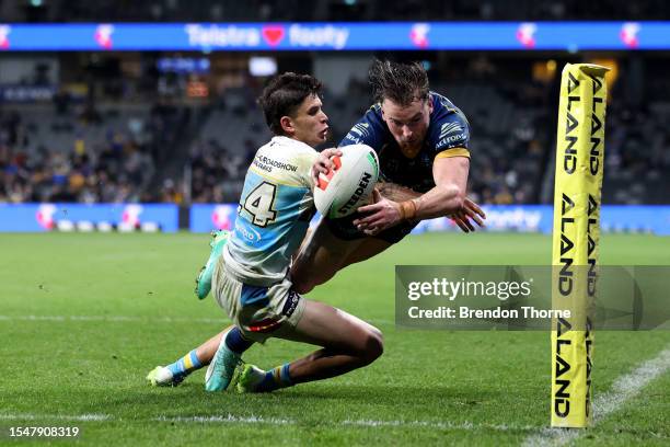 Clint Gutherson of the Eels scores a try during the round 20 NRL match between Parramatta Eels and Gold Coast Titans at CommBank Stadium on July 16,...