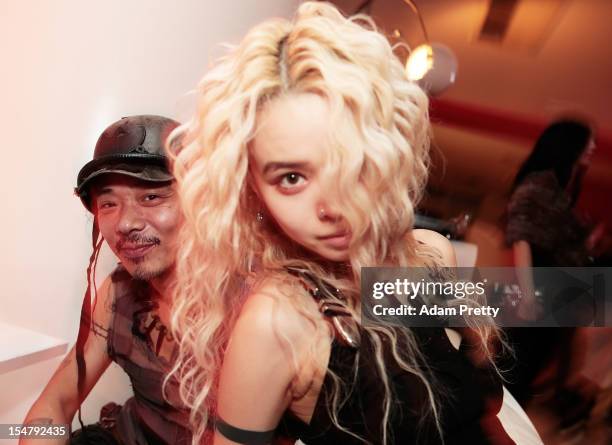 Guests pose for a photograph during the ELLEgirl Night in association with Chrome Hearts at Fiat Caffe on October 26, 2012 in Tokyo, Japan.