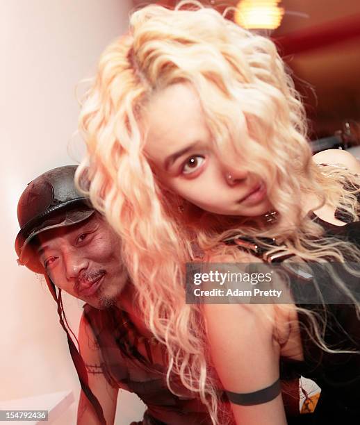 Guests pose for a photograph during the ELLEgirl Night in association with Chrome Hearts at Fiat Caffe on October 26, 2012 in Tokyo, Japan.