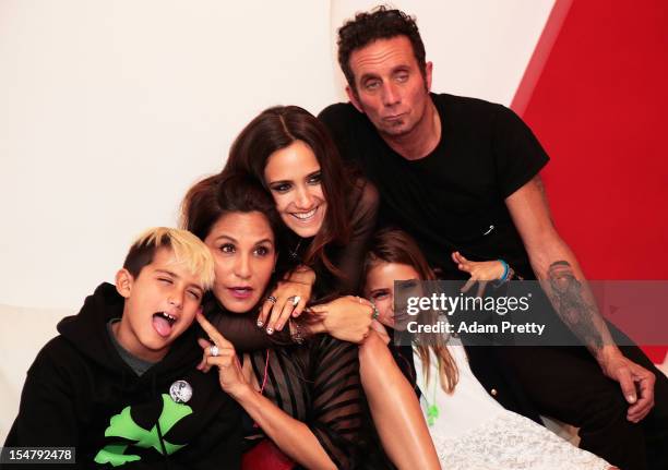 Laurie Lynn Stark, Richard Stark, Jesse Jo Stark, Frankie Belle Stark and Kristian Stark pose for a family photograph during the ELLEgirl Night in...