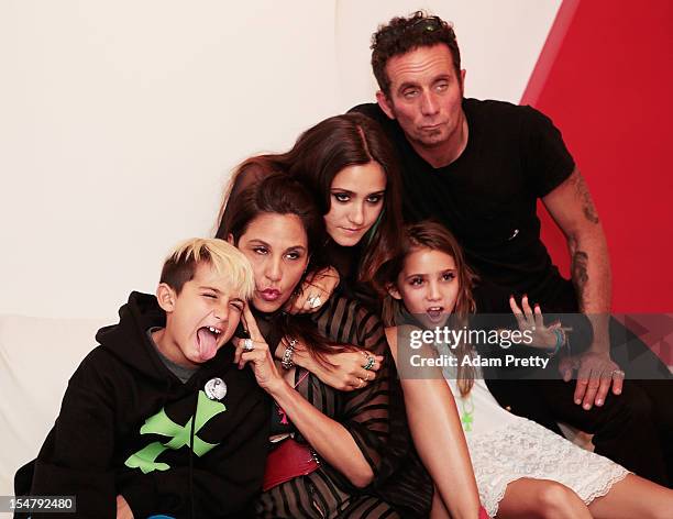 Laurie Lynn Stark, Richard Stark, Jesse Jo Stark, Frankie Belle Stark and Kristian Stark pose for a family photograph during the ELLEgirl Night in...