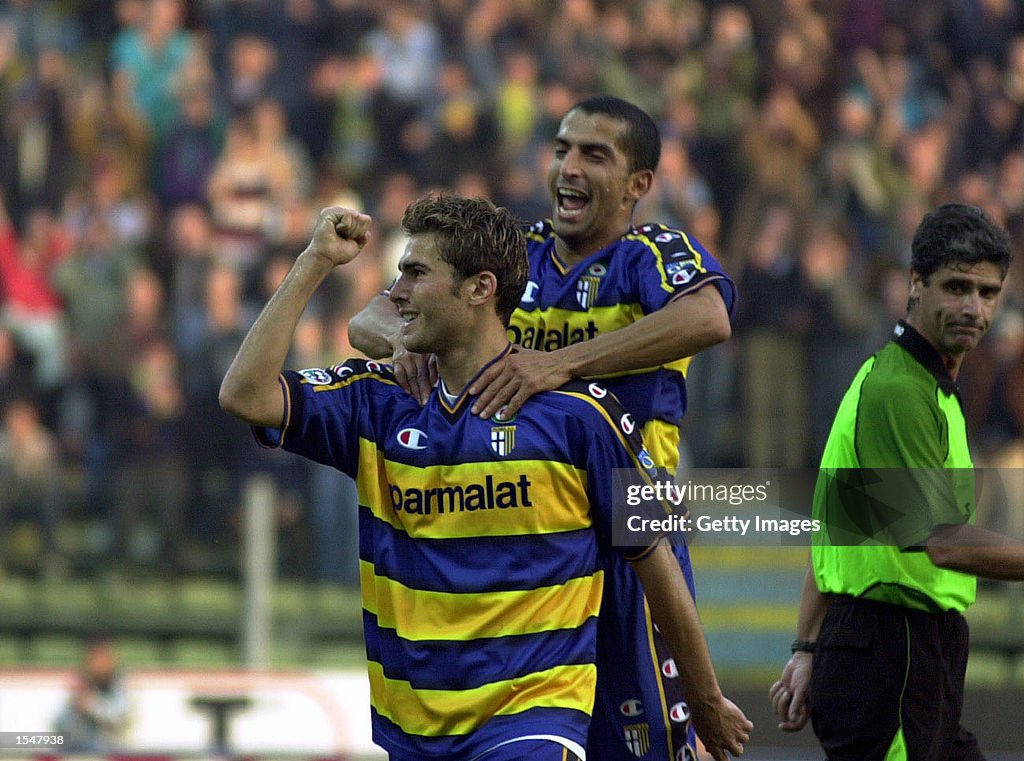 Adrian Mutu of Parma celebrates scoring