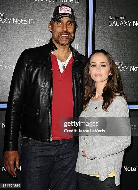 Rick Fox and Eliza Dushku attend the launch of the Samsung Galaxy Note II on October 25, 2012 in Beverly Hills, California.