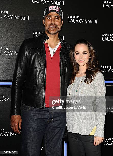 Rick Fox and Eliza Dushku attend the launch of the Samsung Galaxy Note II on October 25, 2012 in Beverly Hills, California.