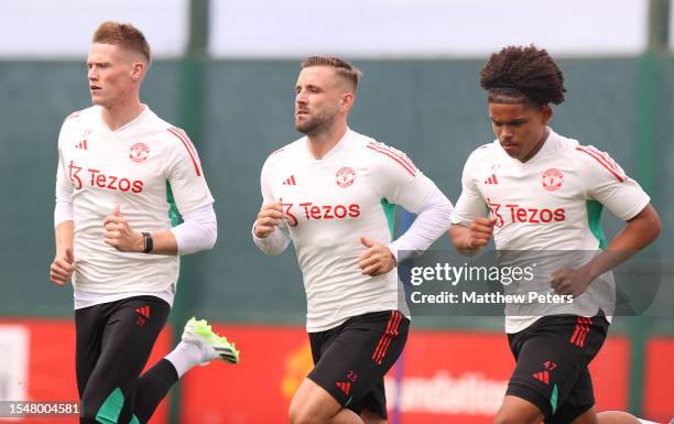 Scott McTominay, Luke Shaw, Shola Shoretire of Manchester United arrives ahead of a pre-season training session at Carrington Training Complex on...