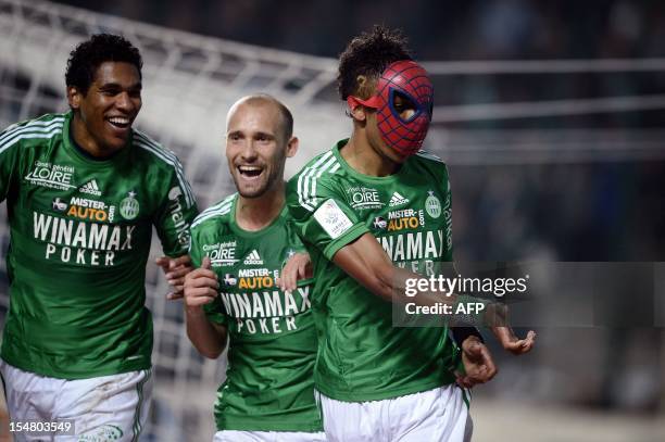 Saint-Etienne's Gabonese forward Pierre-Emerick Aubameyang , wears a spiderman mask after scoring a goal during the French L1 football match AS...