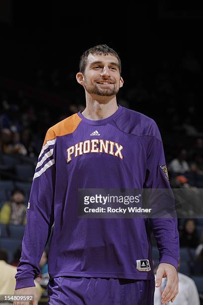 Luke Zeller of the Phoenix Suns warms up before facing the Golden State Warriors on October 23, 2012 at Oracle Arena in Oakland, California. NOTE TO...