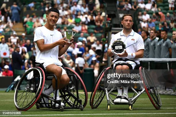 Tokito Oda of Japan with the Men's Wheelchair Singles Trophy alongside Alfie Hewitt of Great Britain and the Runner's Up Plate following the Men's...