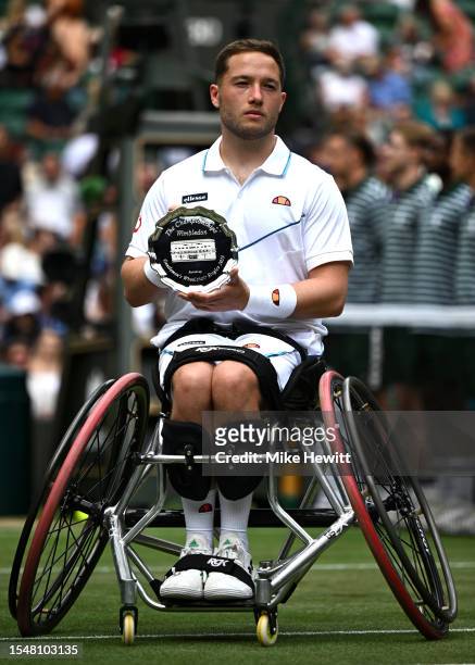 Alfie Hewitt of Great Britain with the Runner's Up Plate following defeat in the Men's Wheelchair Singles Final against Tokito Oda of Japan on day...