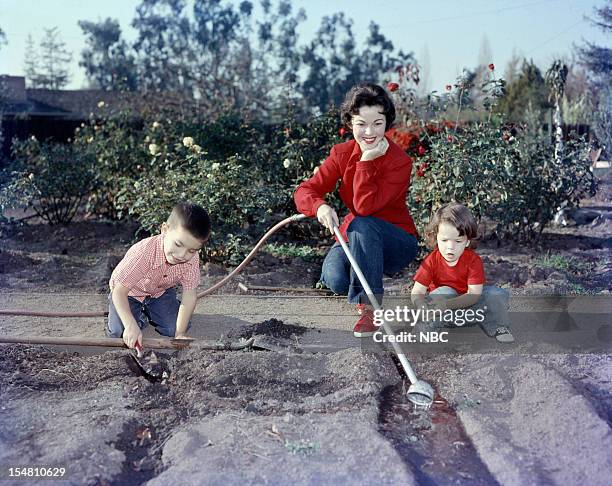 Pictured: Son Charles Black Jr., actress Shirley Temple, daughter Lori Black at home in 1957 --