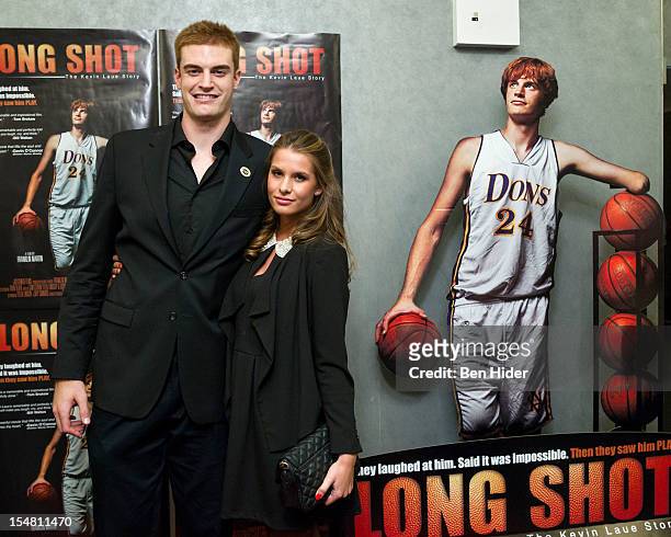 Athlete Kevin Laue and girlfriend attend the "Long Shot: The Kevin Laue Story" New York Preimere at Quad Cinema on October 26, 2012 in New York City.