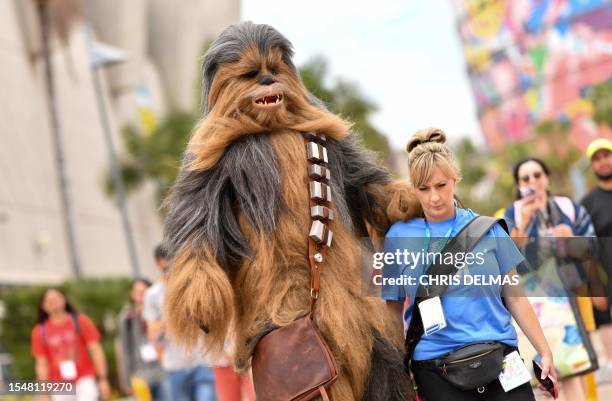 Chewbacca cosplayer walks outside the convention center during San Diego Comic-Con International in San Diego, California, on July 22, 2023.