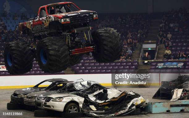 Drivers perform during the 'Monster Trucks All Out Tour' in Brampton, Ontario on July 22, 2023.