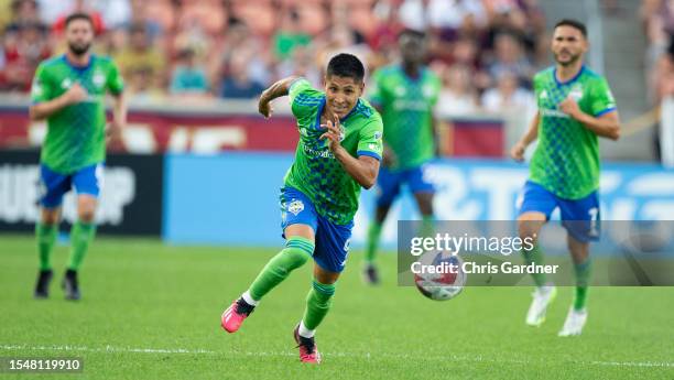 Raul Ruidiaz of the Seattle Sounders rushes the ball up the field against Real Salt Lake during the first half of their Leagues Cup game at America...