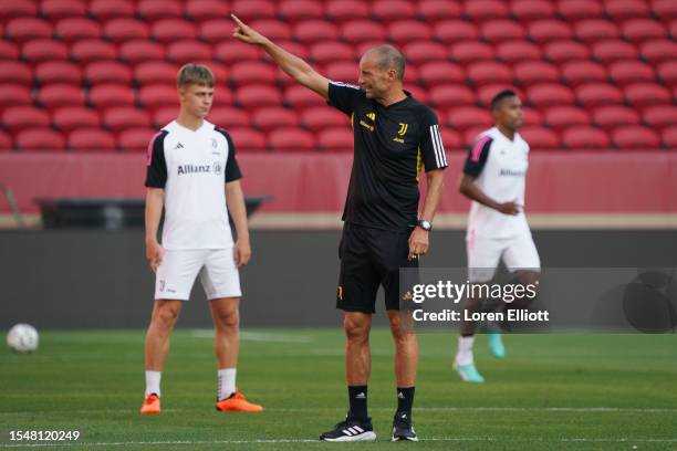 Head coach Massimiliano Allegri of Juventus gestures during his club's training session after the planned friendly against Barcelona was cancelled,...