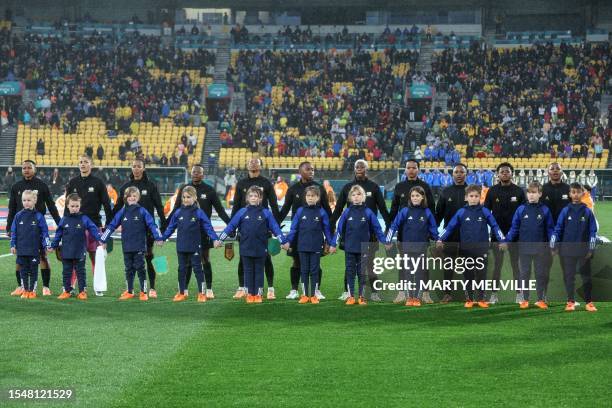 South Africa's players listen to their national anthem before the start of the Australia and New Zealand 2023 Women's World Cup Group G football...