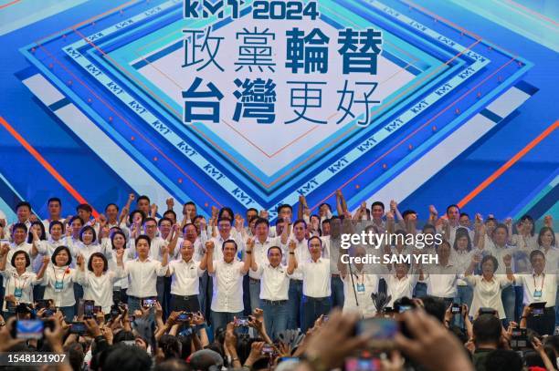 Hou Yu-ih , Taiwan presidential candidate 2024 from the main opposition party Kuomintang , gestures in front of a screen reading 'Party rotation...