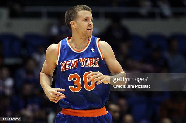 John Shurna of the New York Knicks in action against the Brooklyn Nets during a preseason game at Nassau Coliseum on October 24 2012 in Uniondale,...