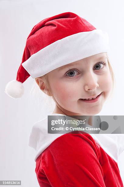 portrait of girl (7) in santa hat - cynthia classen 個照片及圖片檔