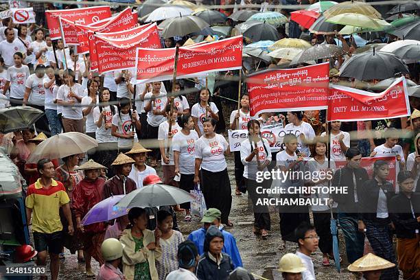 Myanmar-politics-religion-unrest,FOCUS' by Amelie Bottollier-Depois This picture taken on October 10, 2012 shows ethnic Rakhine Buddhist women...