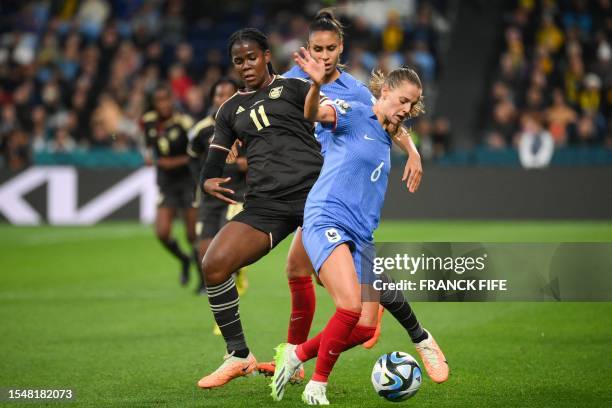 France's midfielder Sandie Toletti#06 Aissatou Tounkara and Jamaica's forward Khadija Shaw fight for the ball during the Australia and New Zealand...